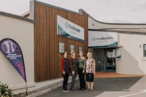Waimea Physiotherapy team front of The Doctors entrance way, Richmond NZ